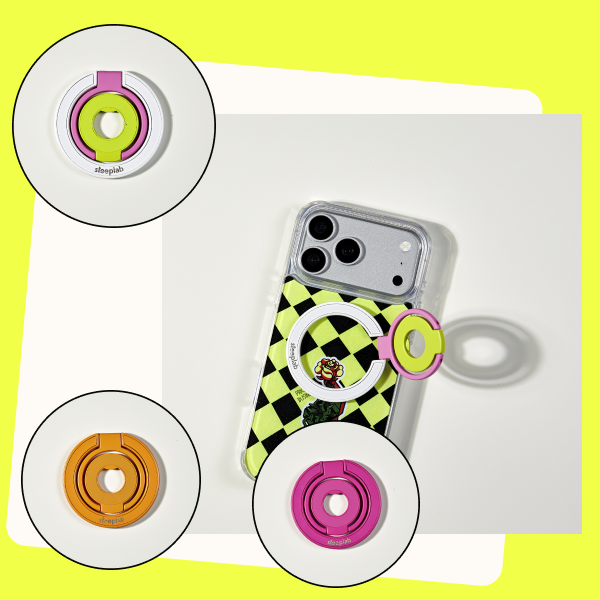 Freehand Loop magnetic grip and stand mounted on a phone, with Unicorn Dream, Mango and Dragonfruit color details. Phone and case sold separately.