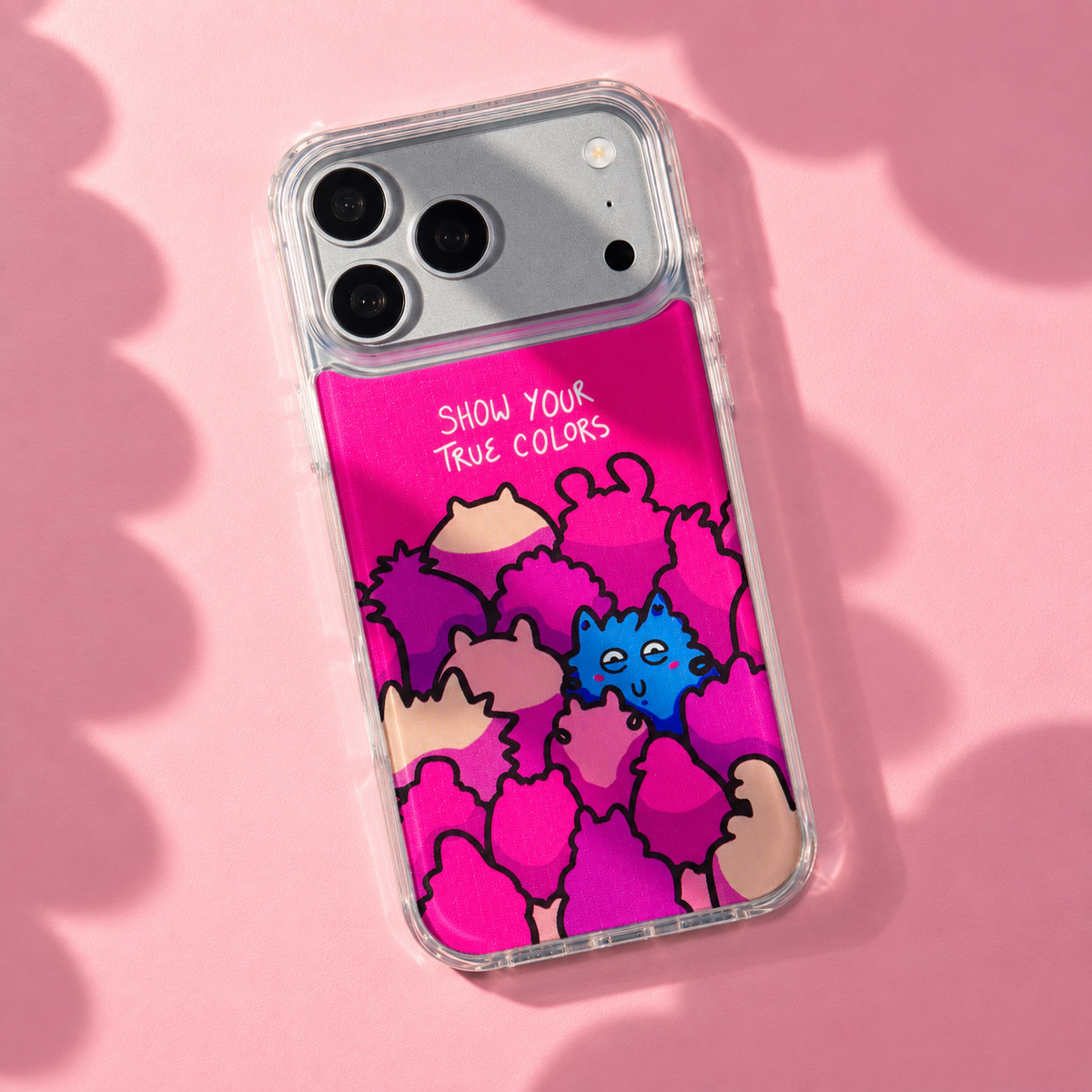 Freehand Case in True Colors for iPhone 18 Pro Max, pink design with colorful illustrated characters, with patterned studio light and shadows.
