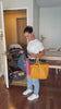 Hands full: dropping a phone, then trying to fit it into a bag